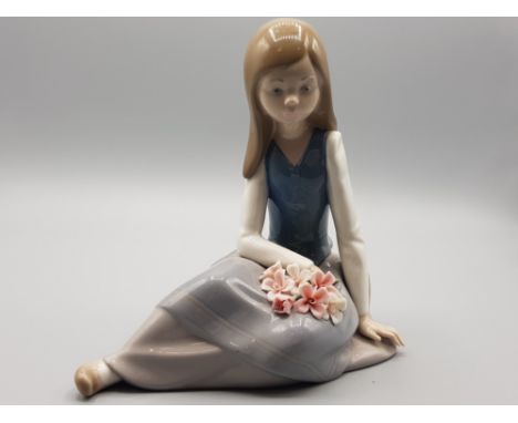 Lladro figure - seated girl with flowers on lap