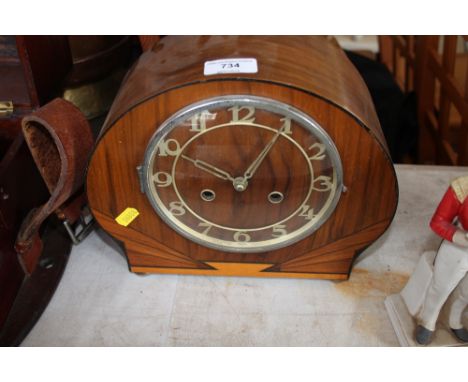 An Art Deco style two hole mantel clock