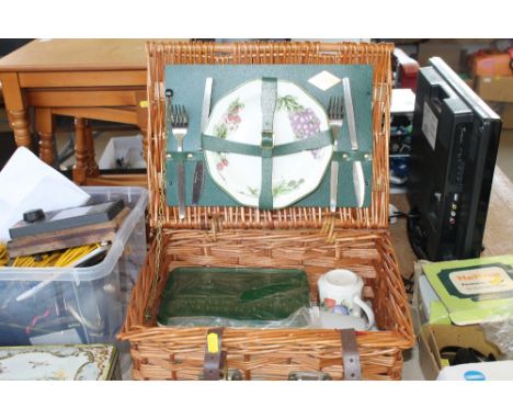 An Amberley wicker picnic hamper and contents