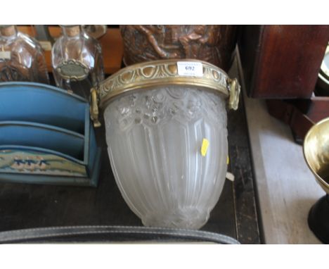 A brass and glass light shade