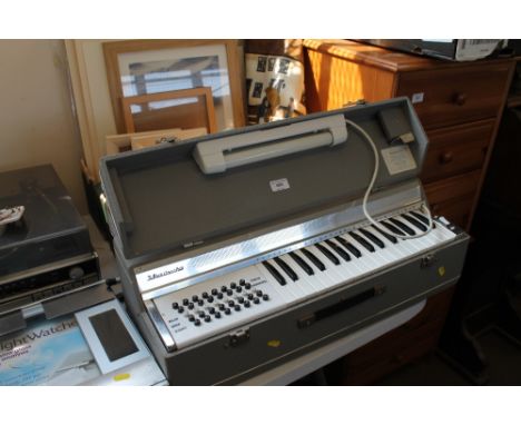A Busilacchio electric portable organ (sold as collector's item)