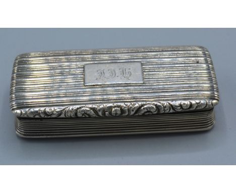 A William IV silver snuff box by Nathaniel Mills, the hinged cover enclosing a silver gilt interior, Birmingham 1827, 3cms x 