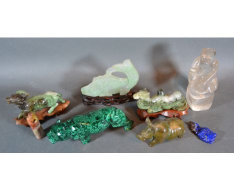 A Chinese Jade Model of a Fish with hardwood stand, 10 cms tall together with various other related models and items 