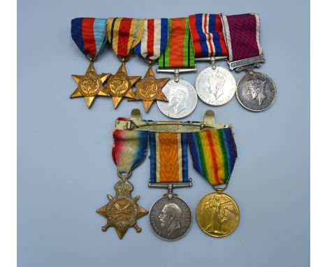 A First World War and Second World War Father and Son Medal Group comprising a First World War group of three to 14166 DVR FJ