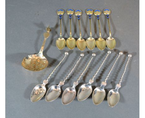 A Set of Six Norwegian Silver Gilt and Enamel Coffee Spoons together with a set of six 830 mark coffee spoons and a continent