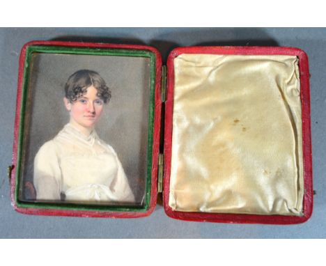 A 19th Century Portrait Miniature in the form of a girl in period dress within leather folding case, 7.5 x 6 cms 