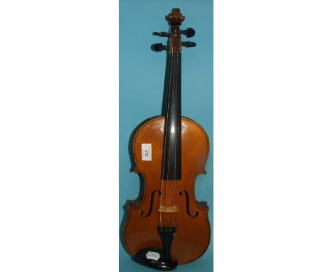 A violin, with a two piece back, and a Stradivarius paper label, in a French inlaid walnut hard case