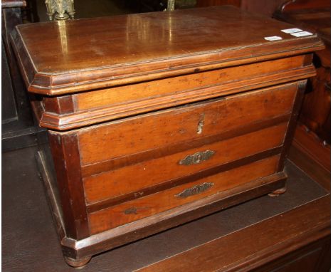 A 19th century French box, in the form of a commode chest of drawers, on bun feet, 55 cm wide