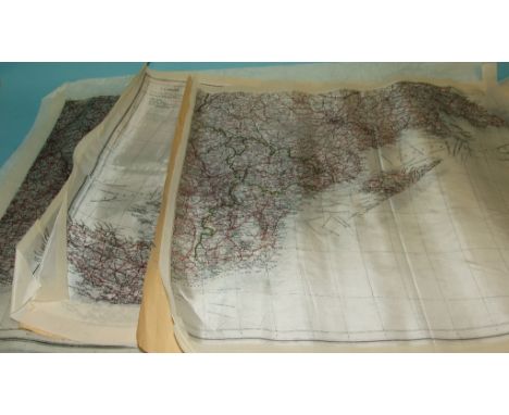 A group of silk and tissue type paper escape style maps, and an opisometer, incorporating a compass