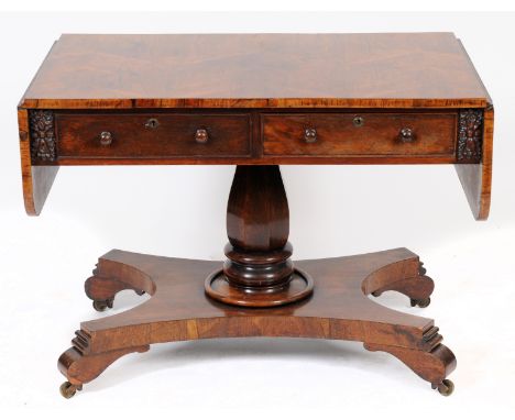 A Victorian rosewood sofa table, 146 cm wide  See illustration