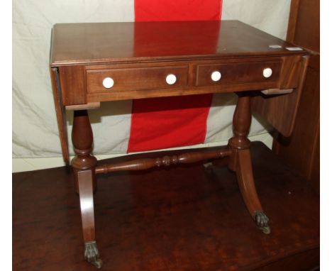 A small sofa style drop leaf table, 104 cm wide