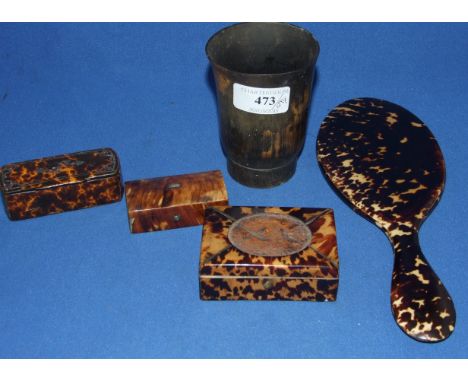 A 19th century tortoiseshell snuff box, other similar snuff boxes, a horn beaker and a simulated tortoiseshell hand mirror (5