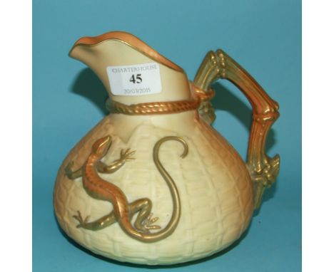 A Royal Worcester blush ivory jug, decorated a lizard, 1714, 15 cm high