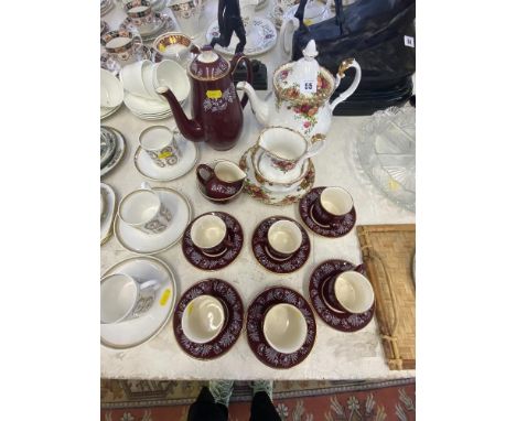 A Royal Albert 'Country Roses' teapot and a Midwinter Maroon coffee set