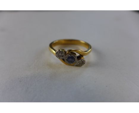 An un-hallmarked gold diamond and sapphire ring, size L, tests to approx 18ct, approx weight 4 grams, generally good conditio