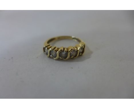 A hand made, yellow gold, five stone diamond ring, diamonds - 4mm round brilliant cut, clarity VS-SI, colour F-G, total appro