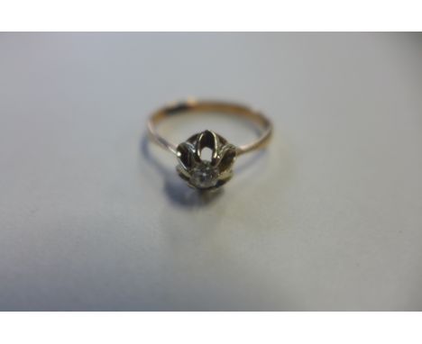 A Russian rose gold diamond solitaire ring, with Russian hallmark and stamped 583, Russian standard - tested as approx 14ct, 