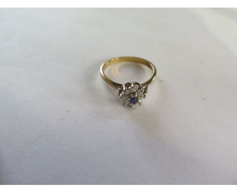 A hallmarked 18ct yellow gold diamond and sapphire cluster ring, size M, approx 2.9 grams, generally good condition 