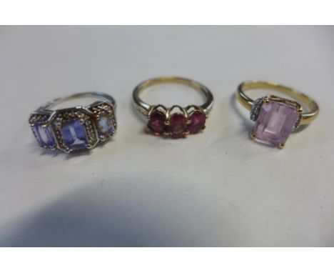 Three 9ct gold rings, sizes N and K, approx 7.3 grams, in good condition 
