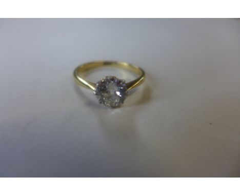 An 18ct yellow gold, hallmarked diamond solitaire ring, the diamond approx 1.00ct, ring size L, approx 3 grams, diamond brigh