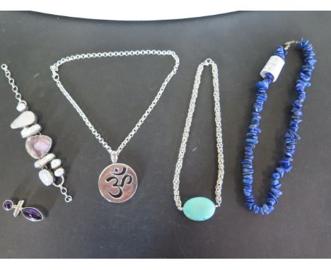 A collection of silver jewellery with turquoise, black onyx and amethyst, also a bracelet set with amethyst, mother of pearl 