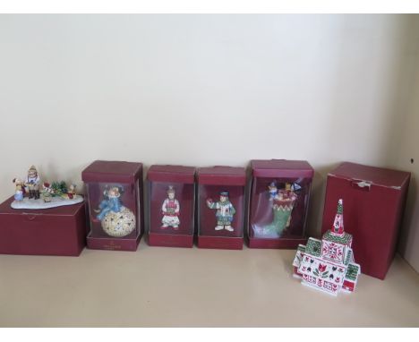 A collection of five boxed Villeroy and Boch Christmas figures and a church candle light, all good - six in total 