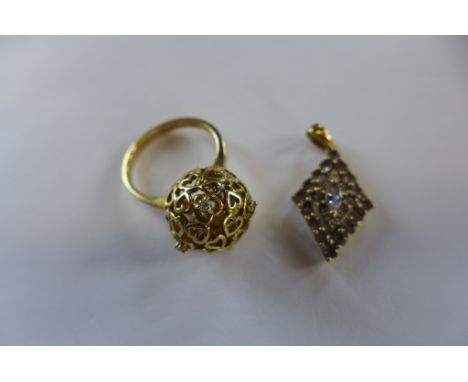 A 9ct gold amethyst pendant and silver gilt ring, size P, approx 1.4 grams 