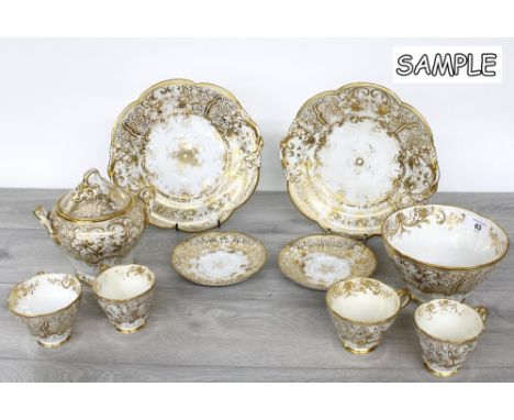 English 19th century porcelain tea service, decorated with gilt highlights&nbsp;comprising nine teacups with saucers, twelve 