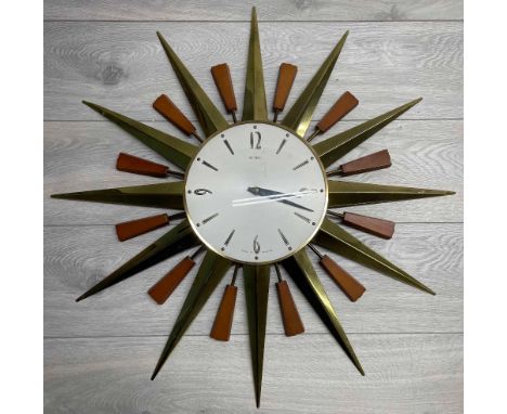 Vintage Metamec starburst wall clock with battery&nbsp;movement, the 8" diameter dial within the starburst frame 24"diameter 