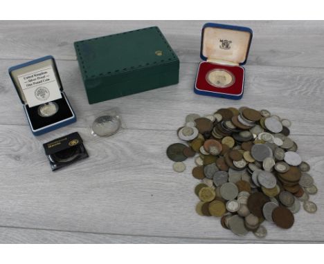 Collection of British and European coins; to include proof examples; within a vintage green Rolex wristwatch box, ref. 68.00.