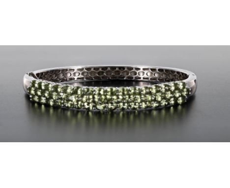 Modern silver peridot set bangle, width 9mm, 22.1gm 