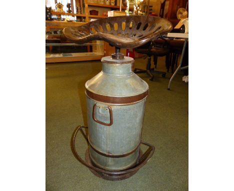 MILK CHURN STOOL. Milk churn stool with cast metal tractor seat, H - 75cm