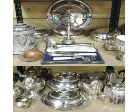 A collection of early 20th century and later silver plated items, to include a pair of spoon warmers in the form of shells, e