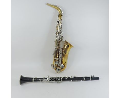 A clarinet, together with a saxophone, each cased, and a collection of didgeridoos