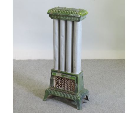 An antique enamel gas stove, 84cm tall