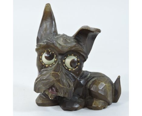 An early 20th century German novelty mantel clock, in the form of a dog, 14cm tall