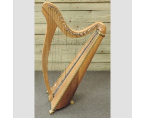 A mid 20th century continental wooden harp, 118cm tall