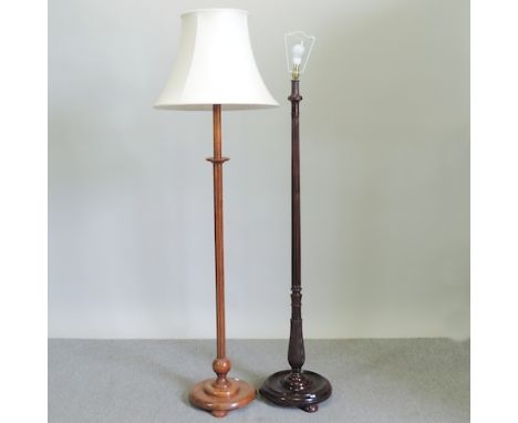 A carved and reeded mahogany standard lamp, together with a carved and reeded oak standard lamp, tallest 151cm 