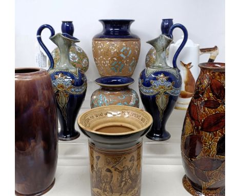 A pair of Royal Doulton ewers, 29 cm high, a Royal Doulton vase, 24 cm high, a pair of Royal Doulton vases, 16 cm high, a Roy
