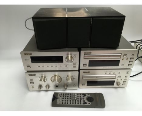 A TEAC mini hi fi stacking system with remote control plus a Bang &amp; Olufsen Beovox CX100 speaker.