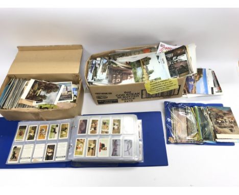 Collection of assorted postcards some used with stamps attached and vintage cigarette cards.