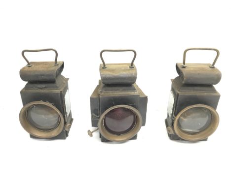 Three vintage car / bicycle lamps.