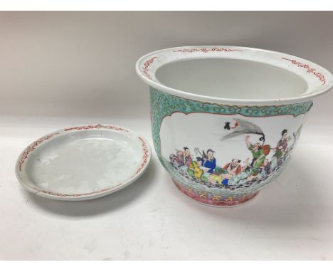 A ceramic Chinese plant pot. Approximately 20cm x 28wide.
