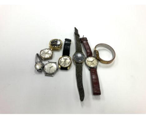 A collection of vintage mens and ladies watches and movements.