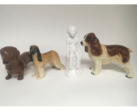 Two Beswick dog ornaments and a Spode ornament Michael by Pauline Shone and one other dog ornament. (4) NO RESERVE