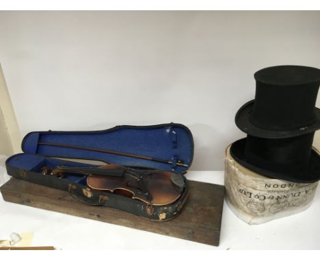 A Vintage top hat a folding top hat a cased violin and a cased set of glass chemistry tubes.