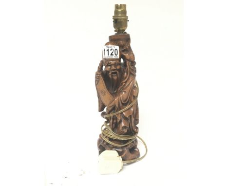 A carved hardwood oriental sage figure converted to a lamp. Height 36cm NO RESERVE