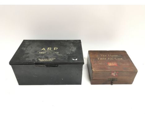 Two vintage boots first aid cases.