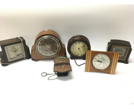 No Reserve - A collection of vintage clocks including an early style alarm clock.