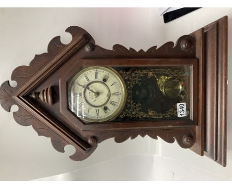 A small American pine mantle clock by F.Pipe, Southwood. NO RESERVE